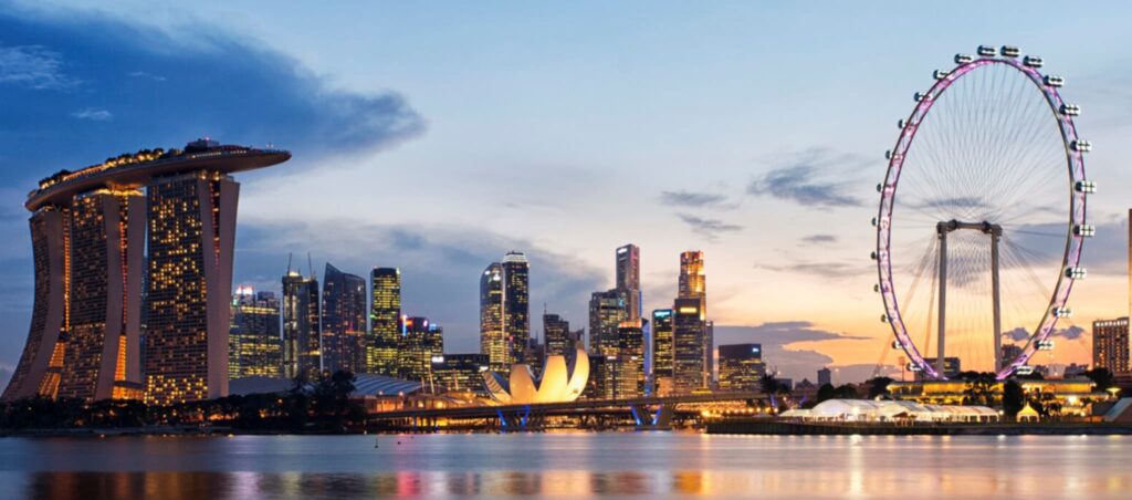 The marina bay sands skyline at dusk in Singapore.