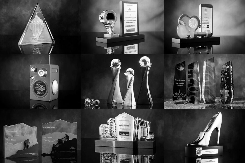 A monochrome image showcasing diverse awards in black and white