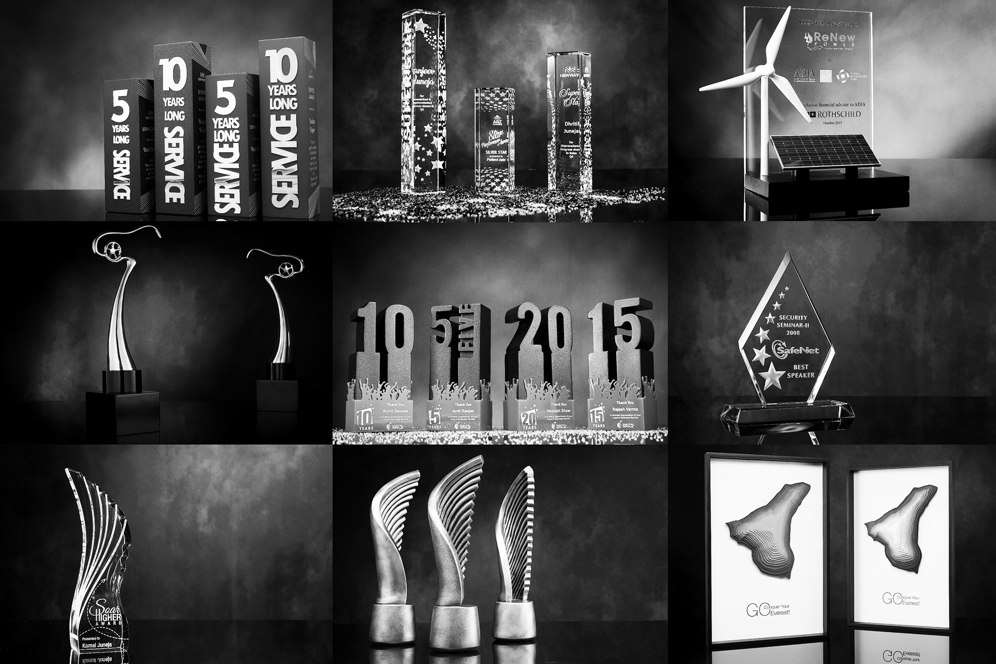 A monochrome image showcasing diverse awards in black and white