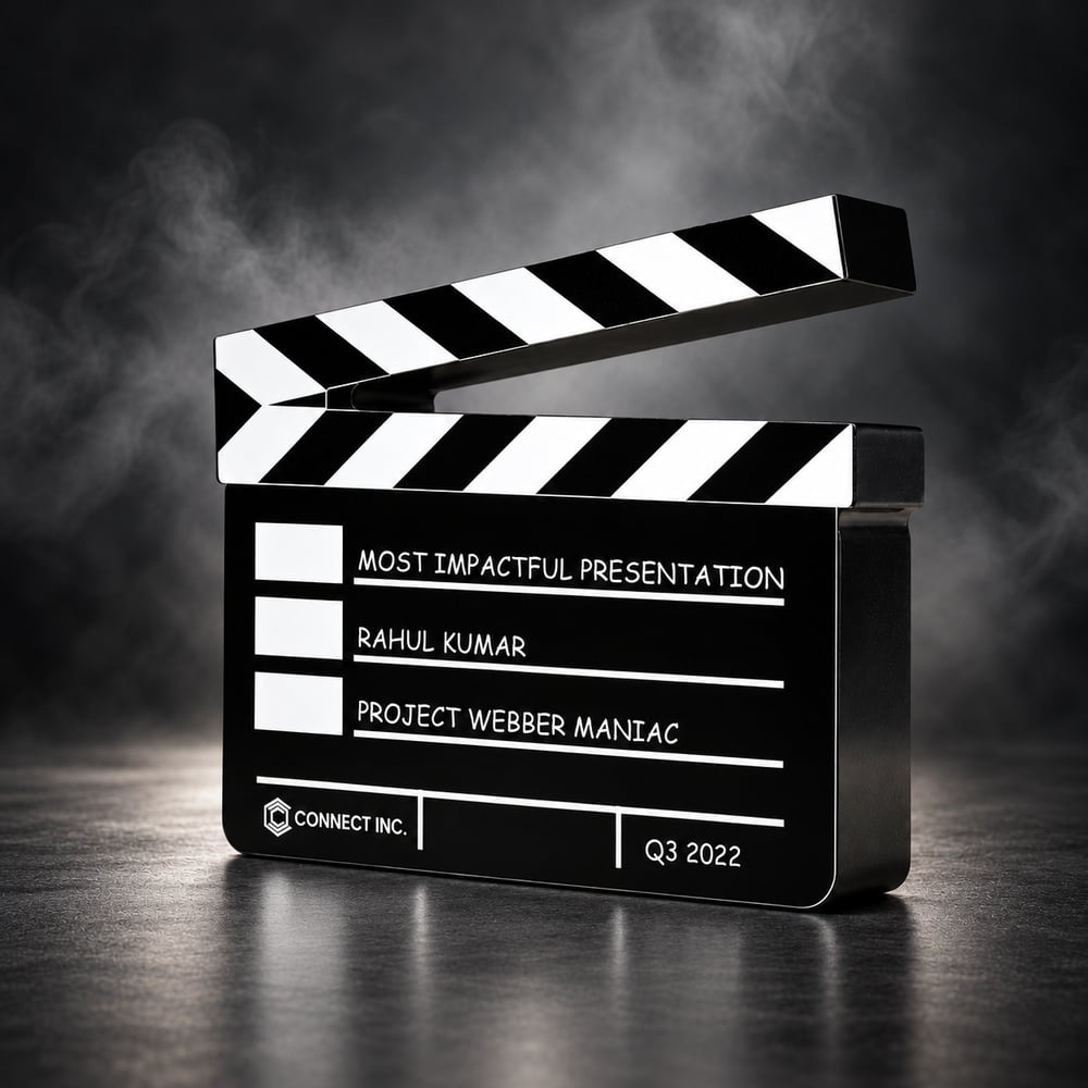 Black and white clapperboard shaped fun award with a raised striped on top