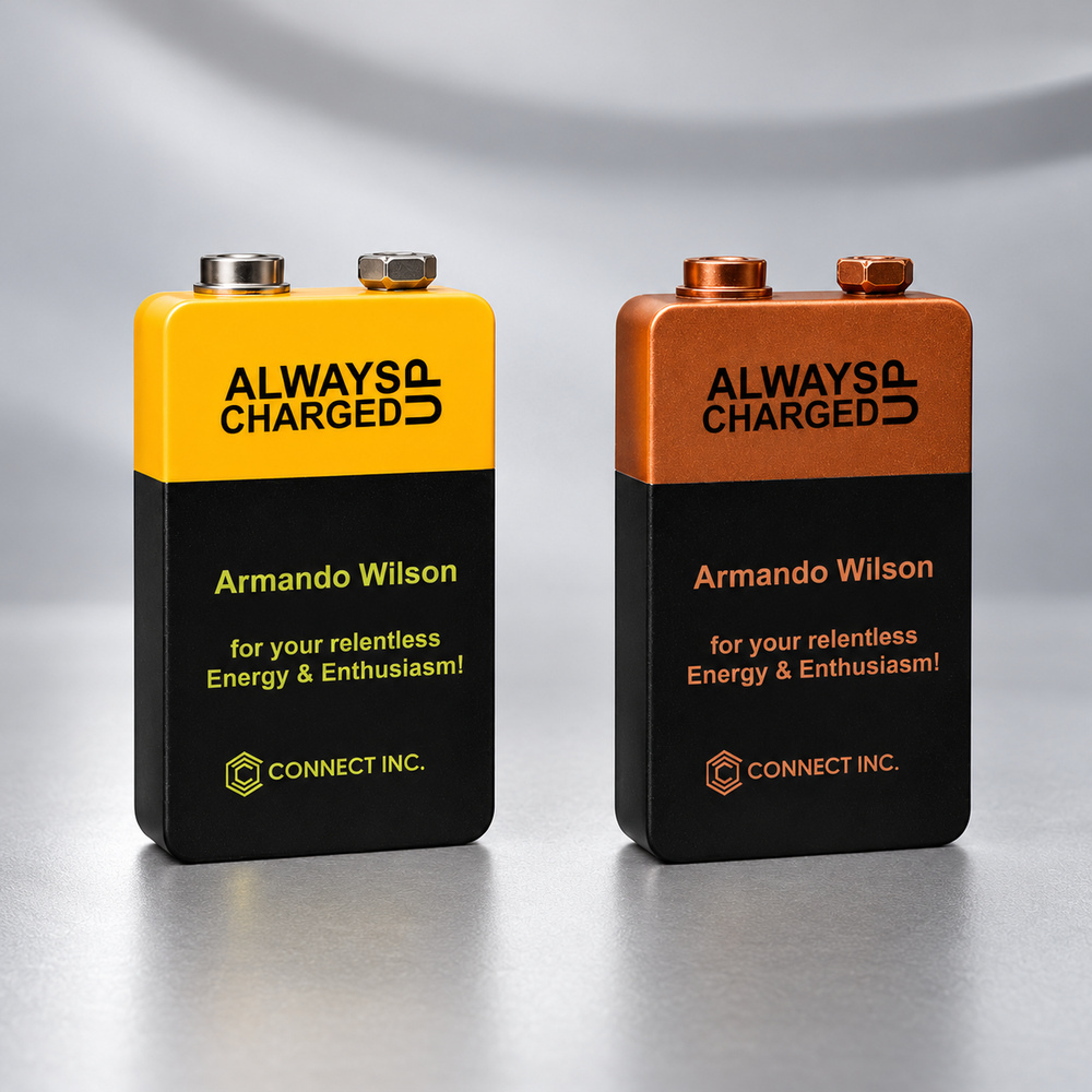 Battery shaped resin awards with yellow and Bright copper on top metallic terminals and custom lettering on a black finish, Fun Award for Office 