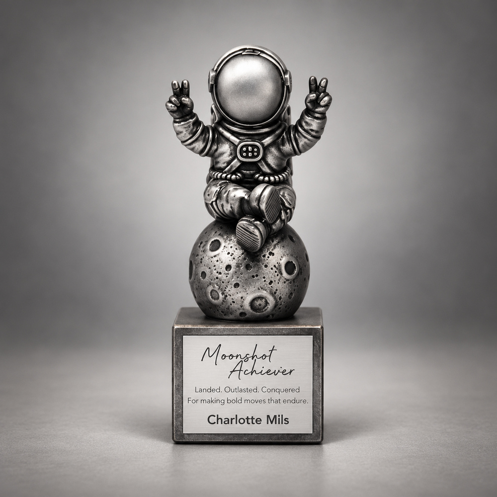 Antique silver resin award seated on a cratered moon, making victory signs above a personalised square base