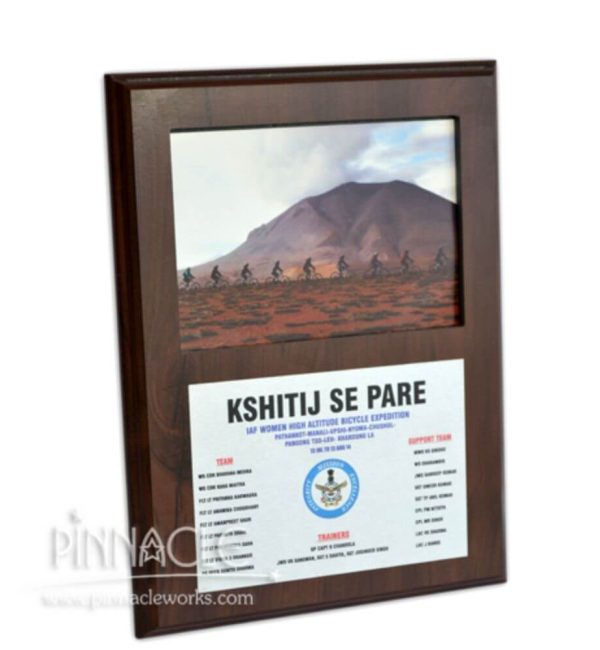 A wooden plaque with inscription KSHITIJ SE PARE